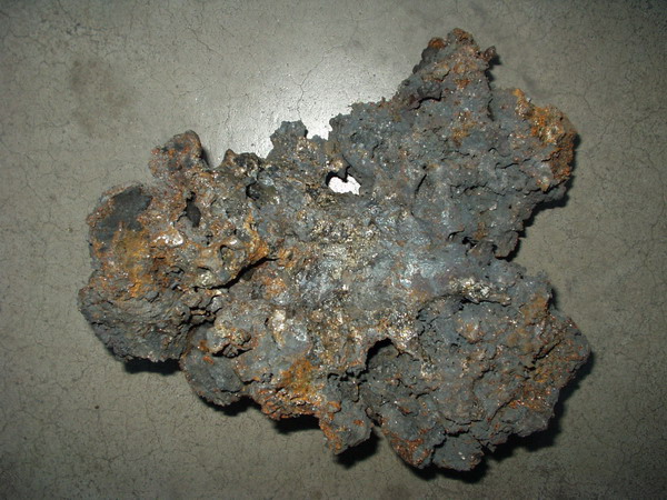 Raw tamahagane steel bloom — the traditional material for katanas
